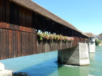 Wooden bridge... Switzerland over on the other side!